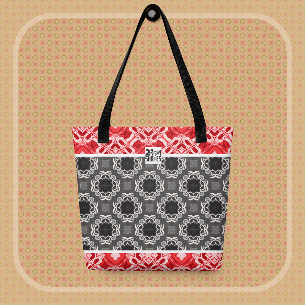 Tote bag with red, black, and white geometric pattern on a beige background