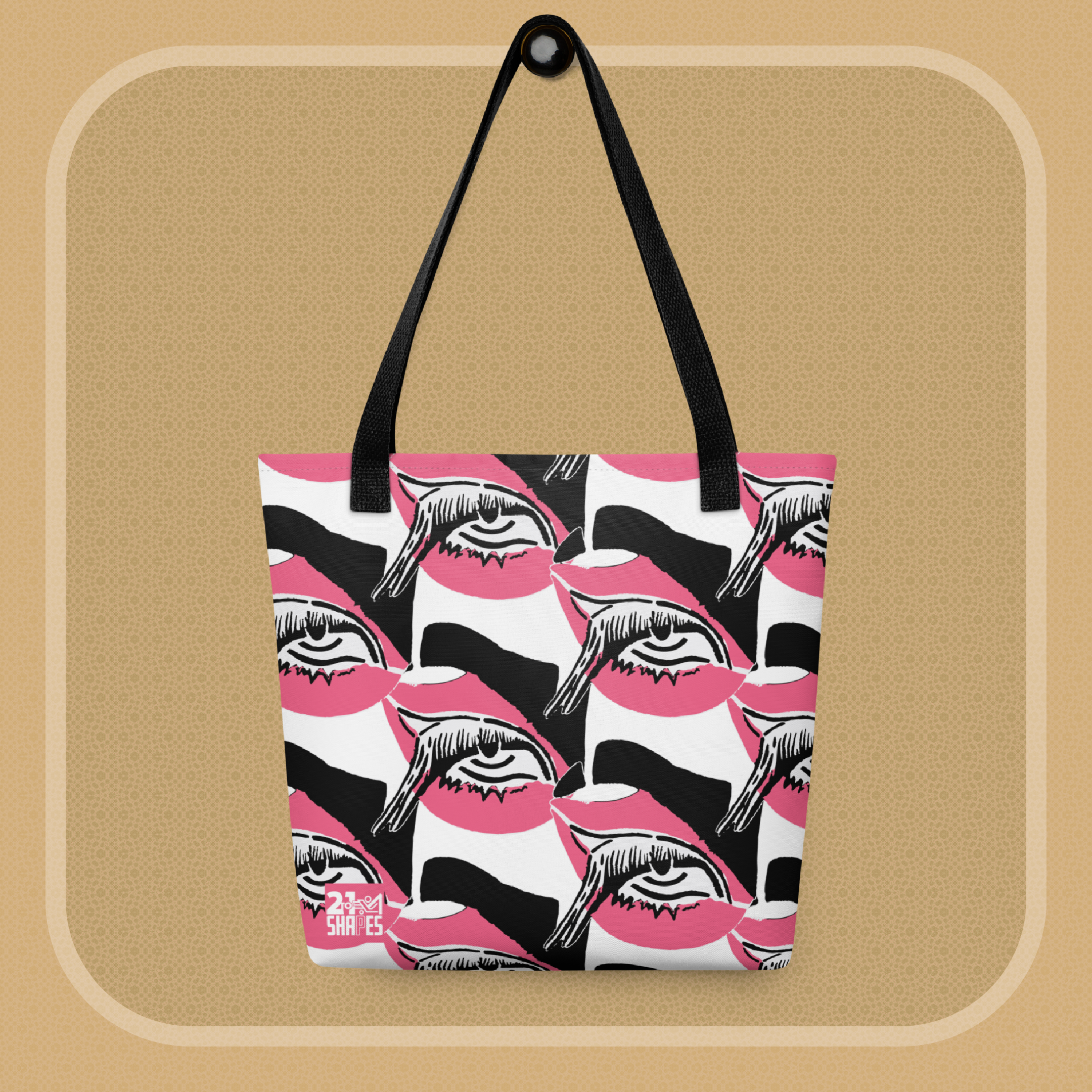 Tote bag with black, white and pink design of a repeating eye on a beige background