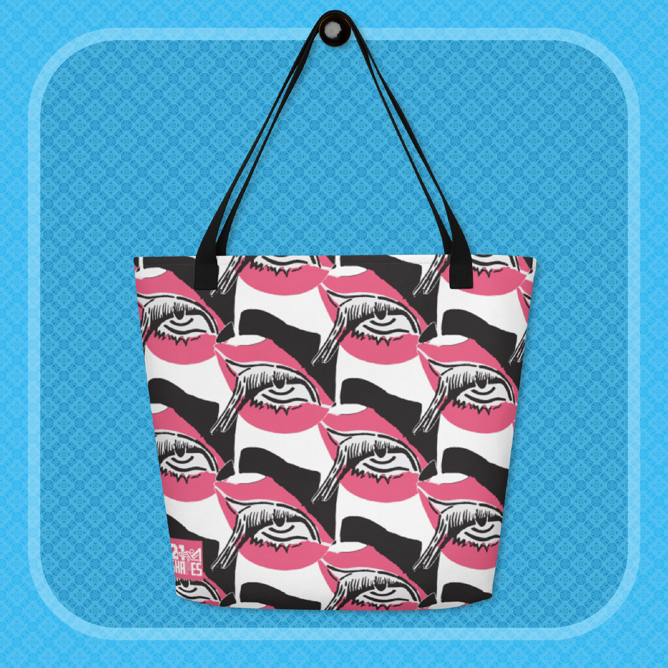 Tote bag with black, white and pink design of a repeating eye on a blue background