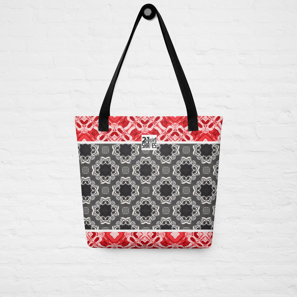 Tote bag with geometric pattern and red accents on a white background